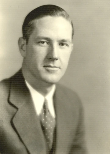 Portrait of a younger John D. Lyons.